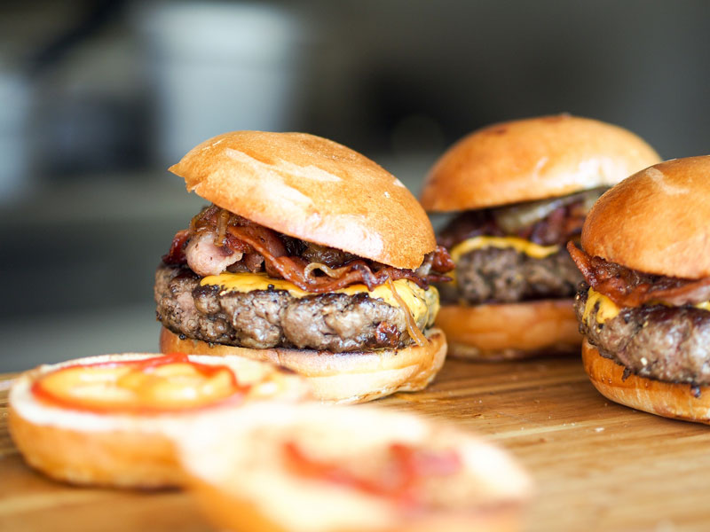 close-up of juicy burgers